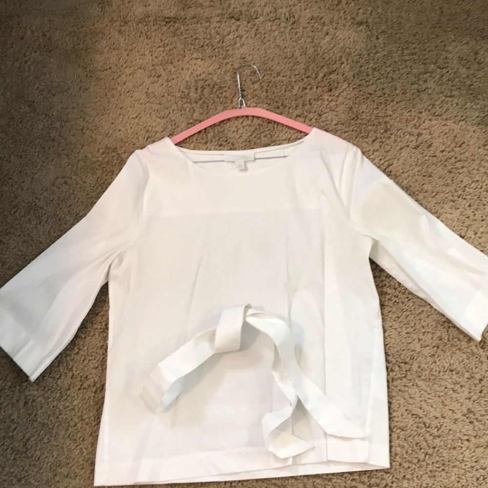 White shirt with tie/belt
